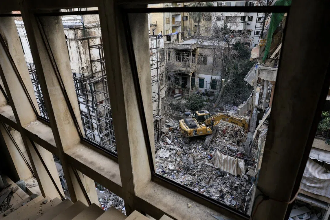 Heavy machinery operates at the site of an Israeli strike in Ain Al Mraiseh in Beirut, Lebanon, on April 9. 