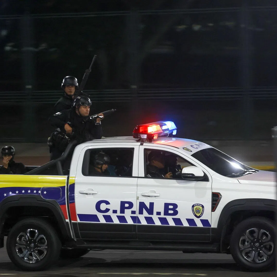 Venezuelan forces patrol the streets in Caracas, Venezuela, on Jan 3, after multiple explosions were reported across the capital.