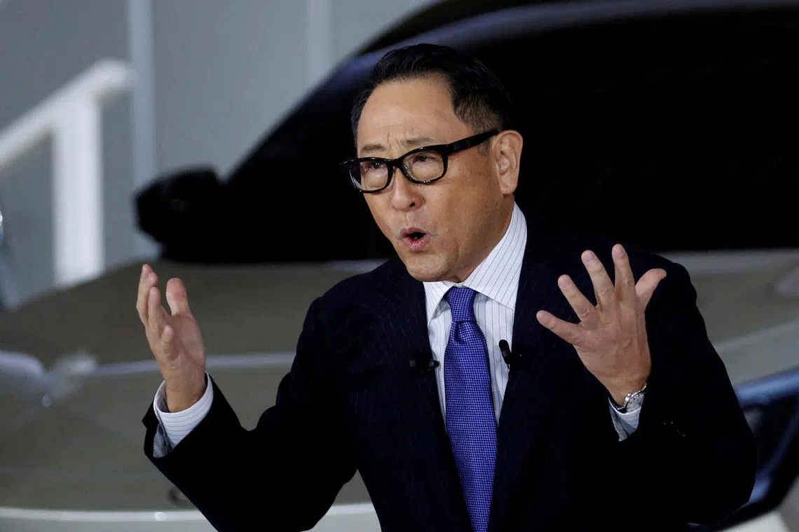 Toyota Motor Corp President Akio Toyoda speaking at a briefing on the company's strategies on battery EVs in Tokyo, Japan on Dec 14.
