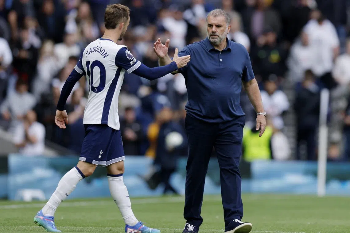 Soccer Football - Premier League - Tottenham Hotspur v Everton - Tottenham Hotspur Stadium, London, Britain - August 24, 2024 Tottenham Hotspur manager Ange Postecoglou shakes hands with James Maddison after the match Action Images via Reuters/Andrew Couldridge