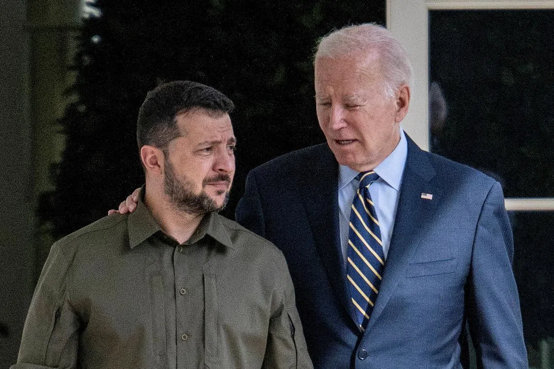 US President Joe Biden and Ukrainian President Volodymyr Zelenskiy walk through the colonnade to the Oval Office, on Sept 21.