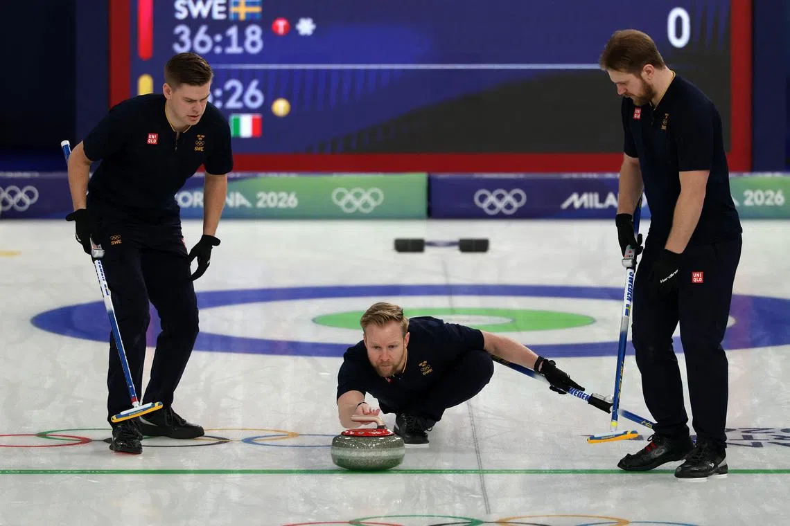 Curling-Champions Sweden lose opener at Games, Britain, Canada win
