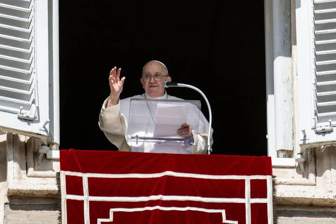 Pope Francis leads the Angelus prayer from his window at the Vatican, October 22, 2023. Vatican Media/­Handout via REUTERS