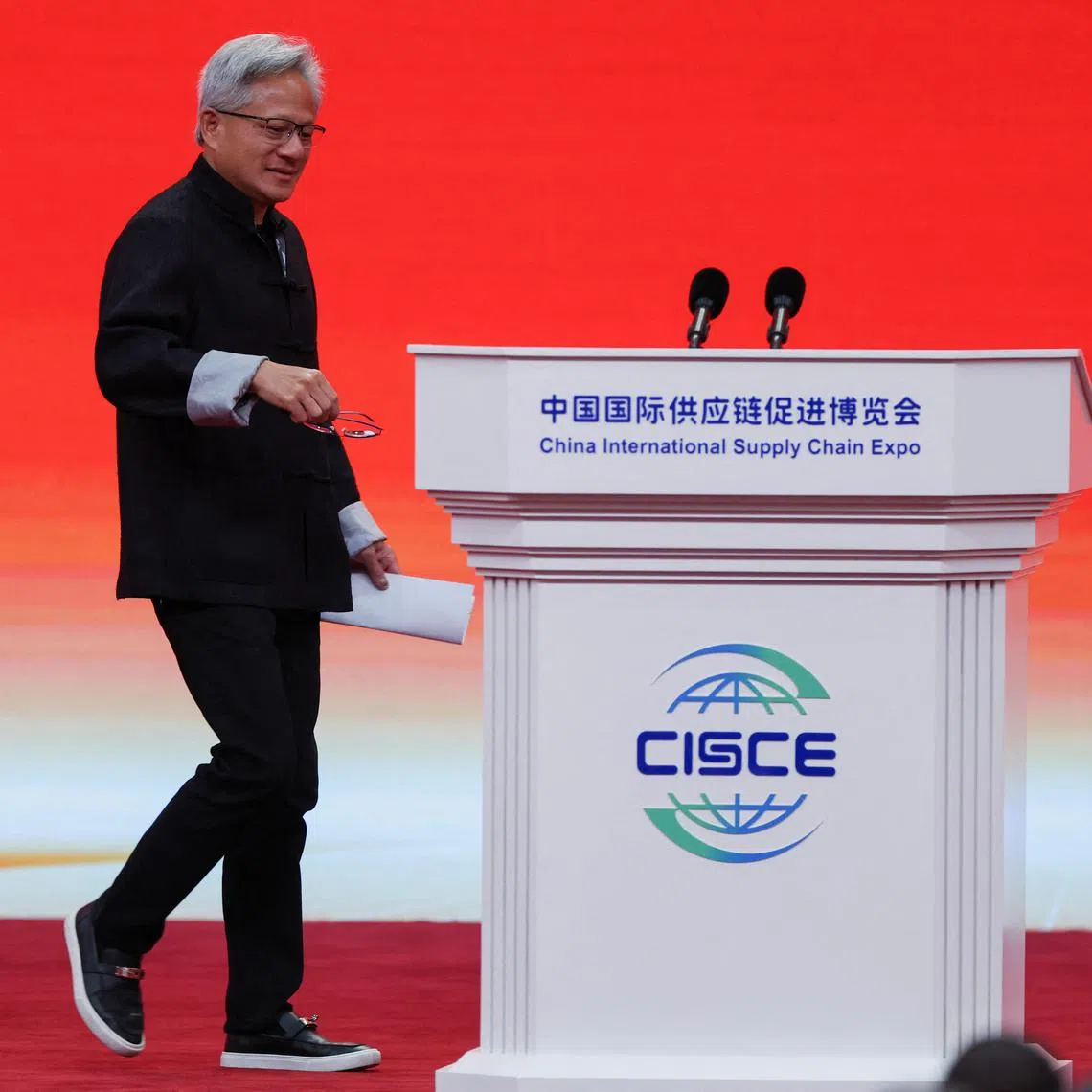 Nvidia CEO Jensen Huang arrives to deliver his speech at the opening ceremony of the third China International Supply Chain Expo (CISCE) in Beijing, China July 16, 2025.