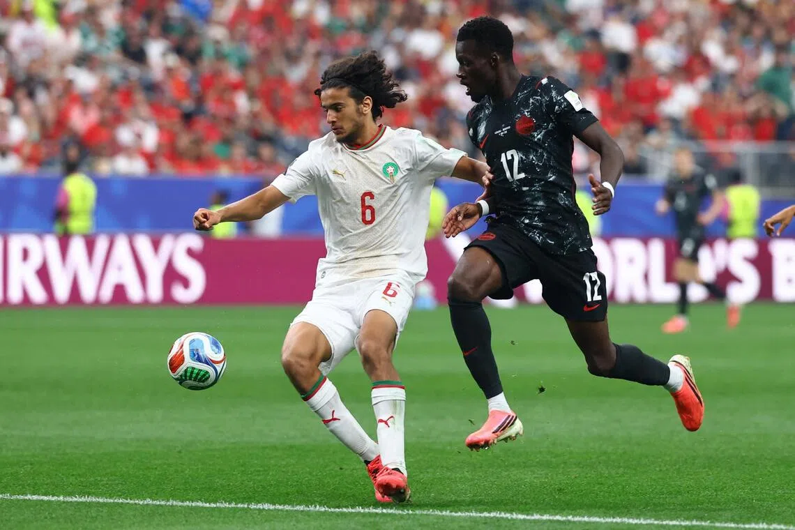 Morocco’s Ayyoub Bouaddi (left) in action with Canada’s Tani Oluwaseyi during a World Cup last-16 clash at NRG Stadium in Houston on July 4.