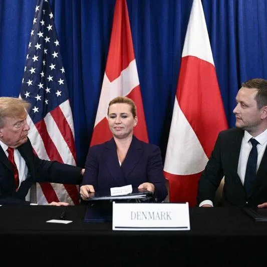 (From left) US President Donald Trump, Denmark’s Prime Minister Mette Frederiksen and Greenland‘s Prime Minister Jens-Frederik Nielsen at the signing of a trilateral security deal in New York on Sept 22.