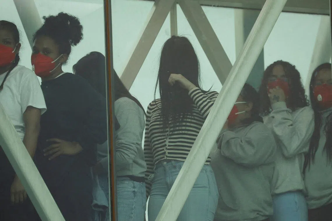 FILE PHOTO: Venezuelan migrants arrive after being deported from the United States, at Simon Bolivar International Airport, in Maiquetia, Venezuela April 23, 2025. REUTERS/Leonardo Fernandez Viloria/File Photo