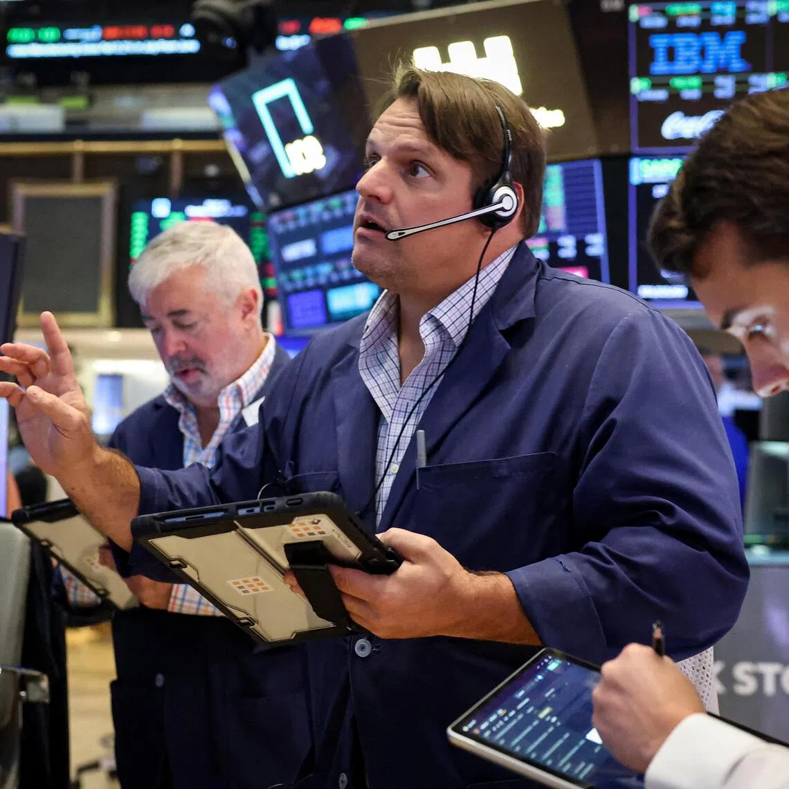 Traders working on the floor of the New York Stock Exchange in New York City, on Aug 24.
