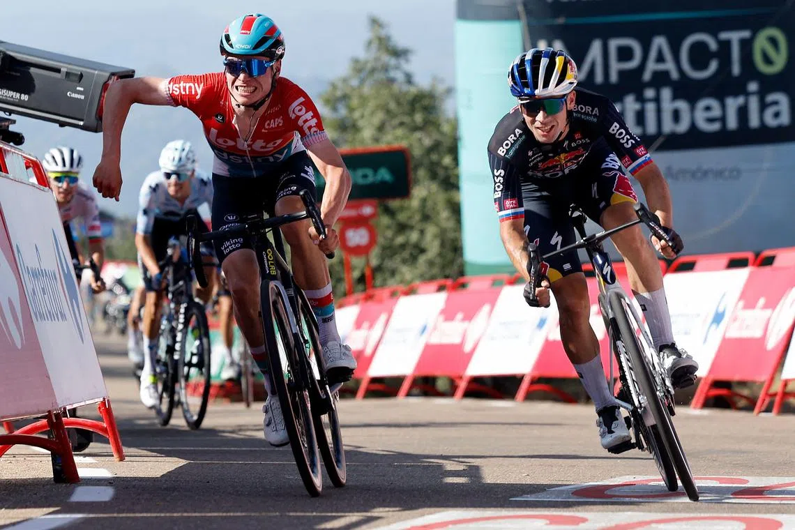 Team Bora's Primoz Roglic (right) aprints to the finish against Team Lotto's Lennert Van Eetvelt.