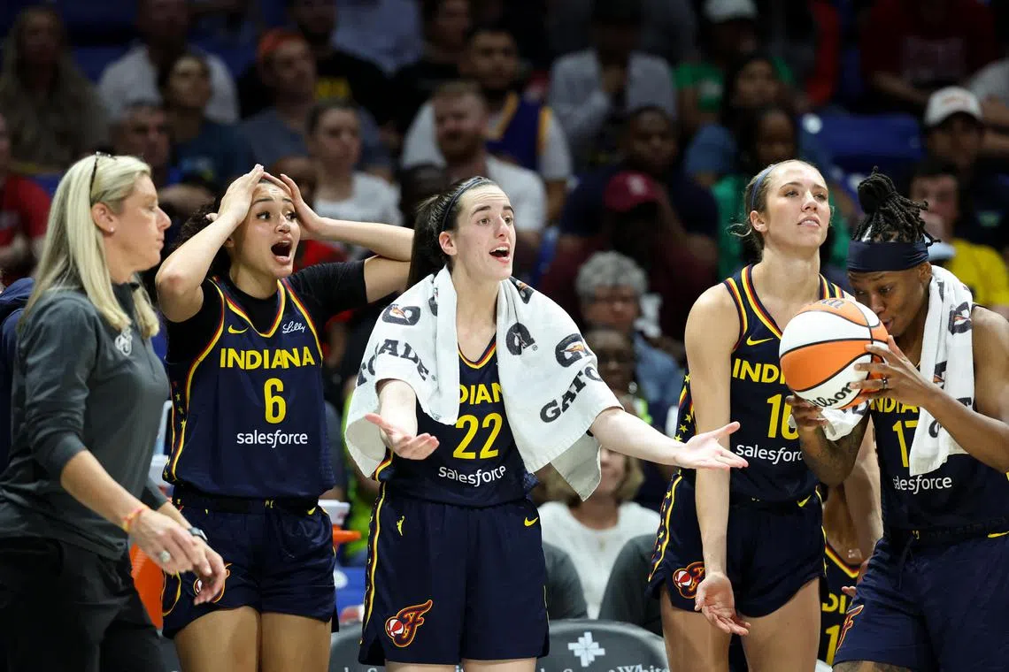 Indiana Fever guard Caitlin Clark (centre) during a pre-season game against the Dallas Wings.