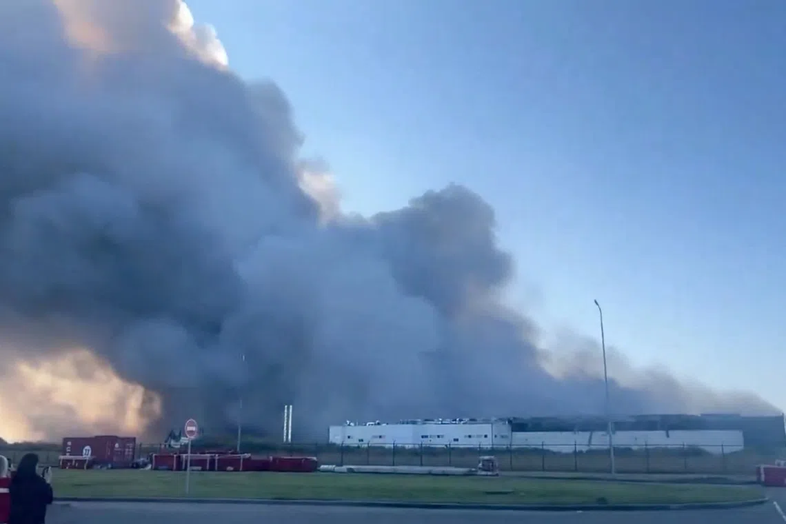 Smoke rises from a logistics hub of Russian e-commerce giant Wildberries, following a drone attack, according to officials, in Kotovsk, Tambov Region, Russia August 26, 2026, in this screen grab obtained from a social media video. Social Media/via REUTERS