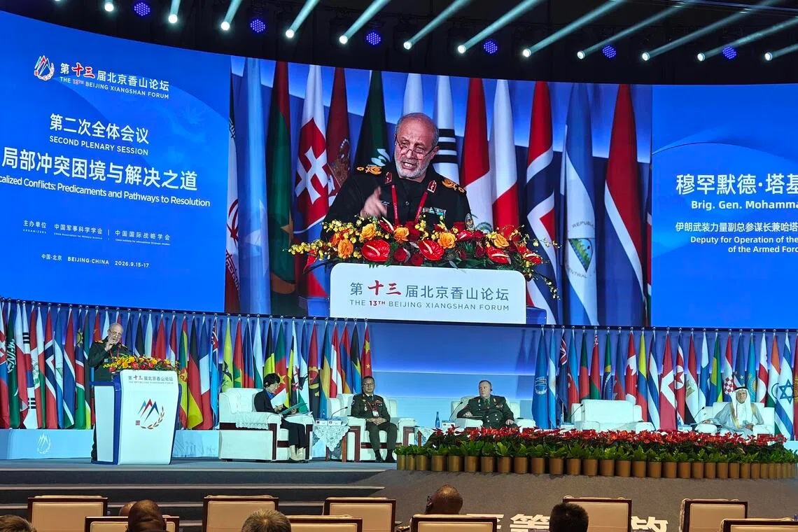 Iranian general Mohammad Taghi Osanlou (at podium) railed against the US for violating his country’s sovereignty at the Beijing Xiangshan Forum on Sept 16. Minutes ago, Saudi Prince Turki al-Faisal (far right) had accused Iran of doing the same to his country.