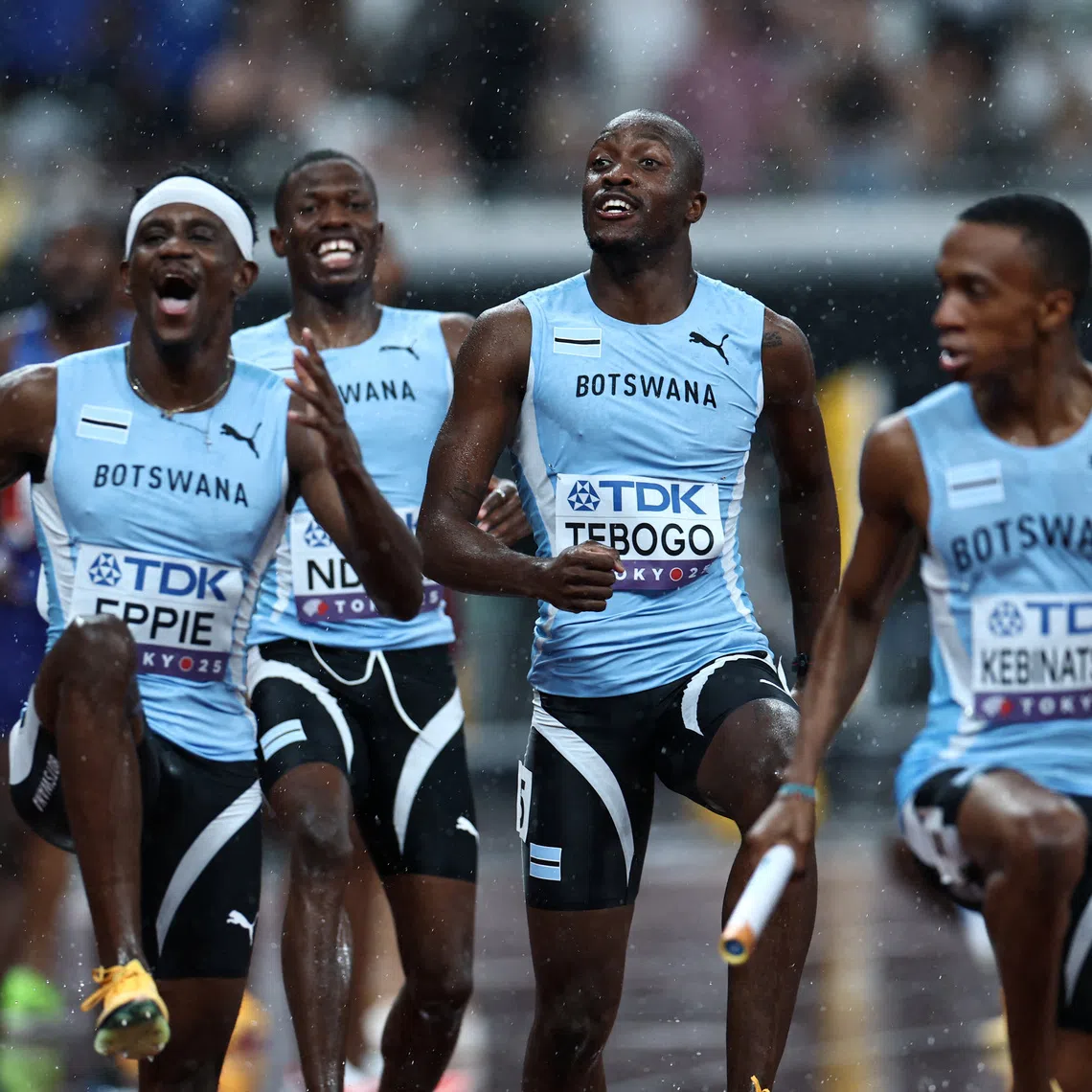 World Athletics Championships Tokyo 2025 - Men's 4 x 400m Relay Final - Japan National Stadium, Tokyo, Japan - September 21, 2025 Botswana's Lee Bhekempilo Eppie, Letsile Tebogo, Bayapo Ndori, and Busang Collen Kebinatshipi celebrate after winning gold REUTERS/Eloisa Lopez