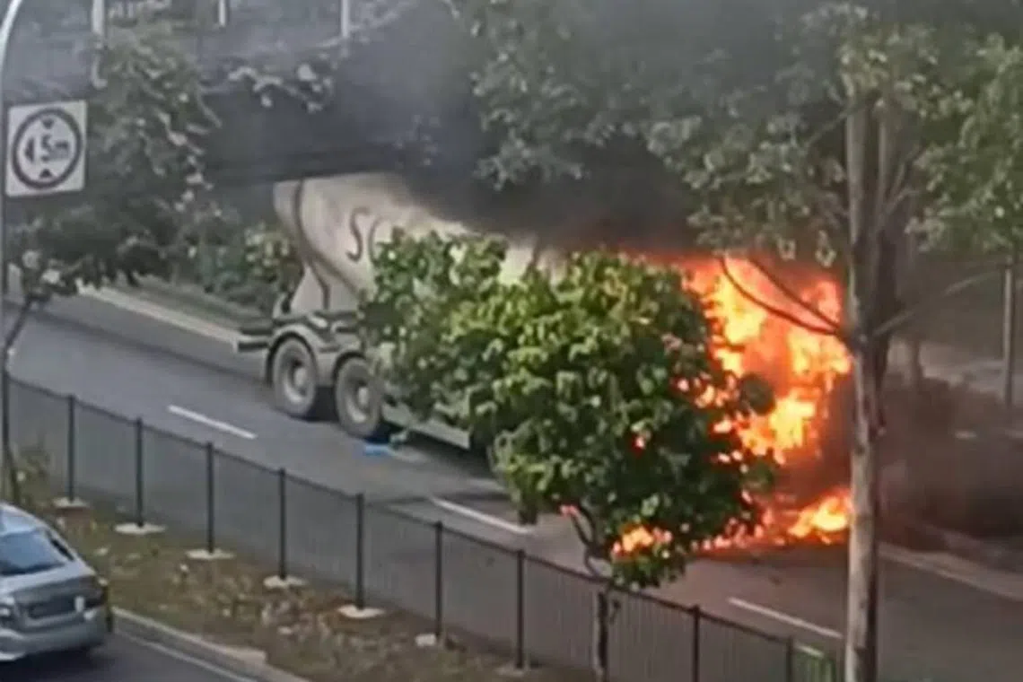 SCDF said it was alerted to the fire, which involved the engine compartment of a truck, at about 8.05am in Corporation Road.