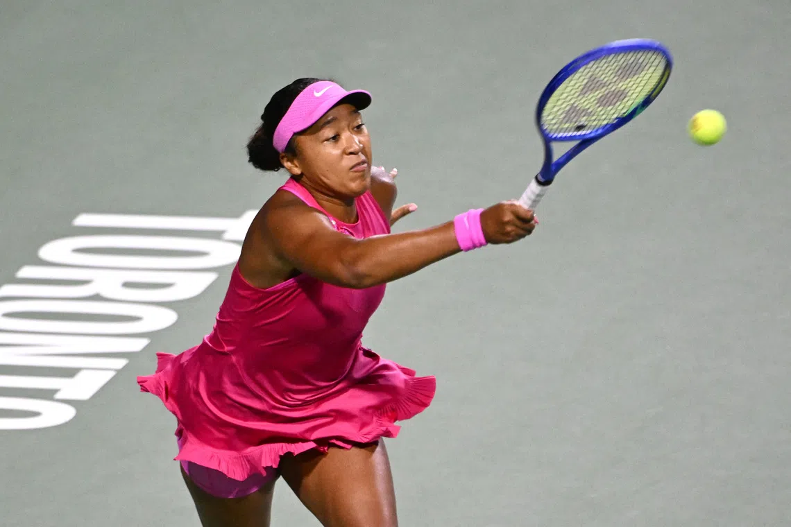 Aug 11, 2026; Toronto, Ontario, Canada;  Naomi Osaka (JPN) plays a shot against Elena Rybakina (KAZ) during quarter final play at Sobeys Stadium. Mandatory Credit: Dan Hamilton-Imagn Images