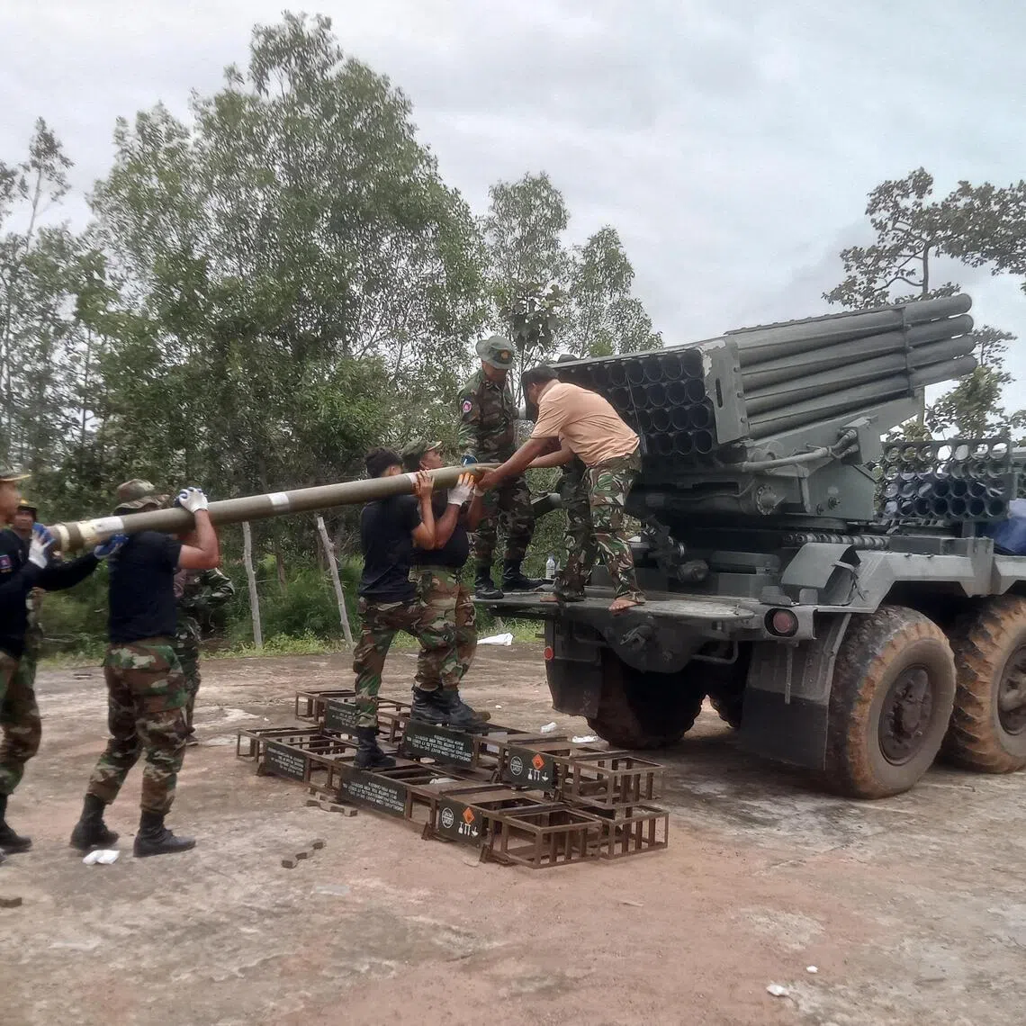 Cambodian soldiers reload the BM-21 multiple rocket launcher in Preah Vihear province on July 24, 2025.