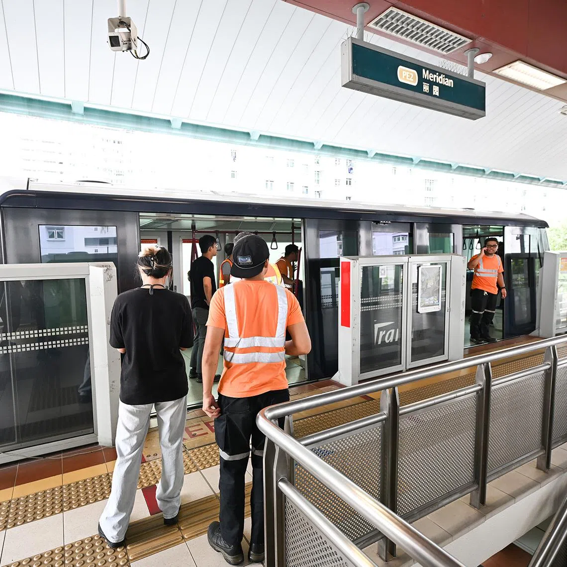 SBS Transit staff working on recovering a stalled LRT train at Meridian LRT station at 11.48am on Aug 15.
