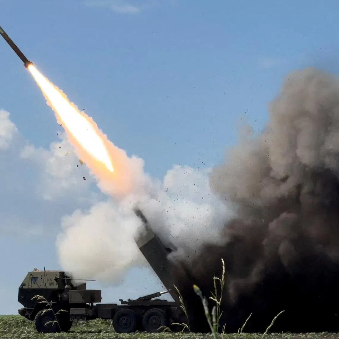 Ukrainian servicemen fire a High Mobility Artillery Rocket System towards Russian troops near the frontline in Donetsk region, Ukraine, on June 24.