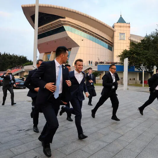 China's Sichuan University, which French President Emmanuel Macron (second from left) visited recently, has overtaken known names like Stanford, MIT and Oxford in high quality scientific research output.
