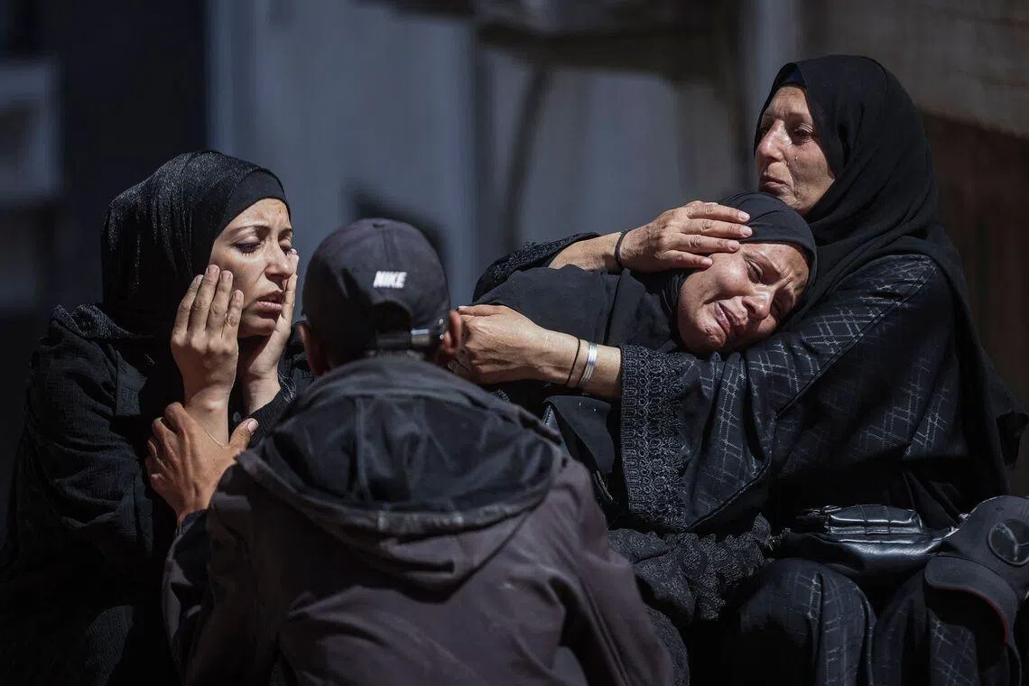 Women mourning during a funeral for ten Palestinians killed in an Israeli strike the night before in Gaza City, on May 28, 2026. 