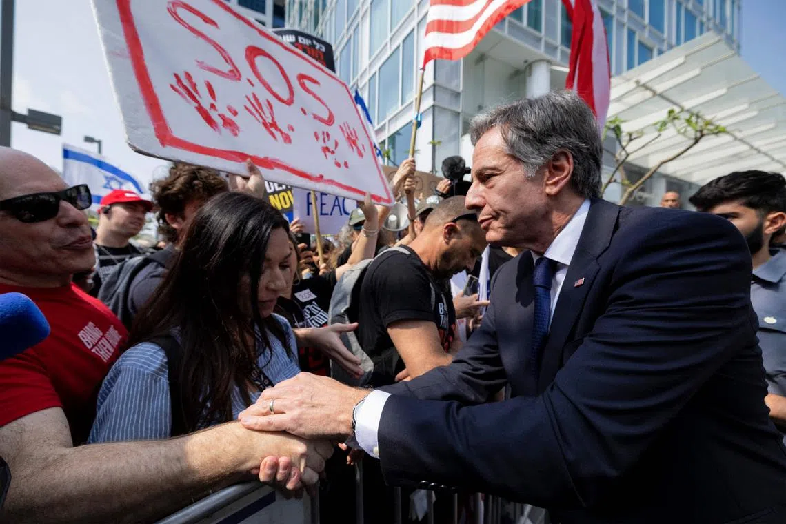 US Secretary of State Antony Blinken meets the families of hostages kidnapped by Palestinian militants during the Oct  7 attacks, as they gather outside a hotel in Tel Aviv on May 1.