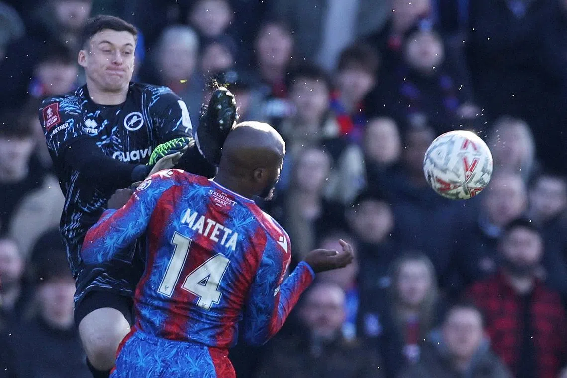 FILE PHOTO: Soccer Football - FA Cup - Fifth Round - Crystal Palace v Millwall - Selhurst Park, London, Britain - March 1, 2025 Millwall's Liam Roberts fouls Crystal Palace's Jean-Philippe Mateta and is later sent off REUTERS/David Klein/File Photo