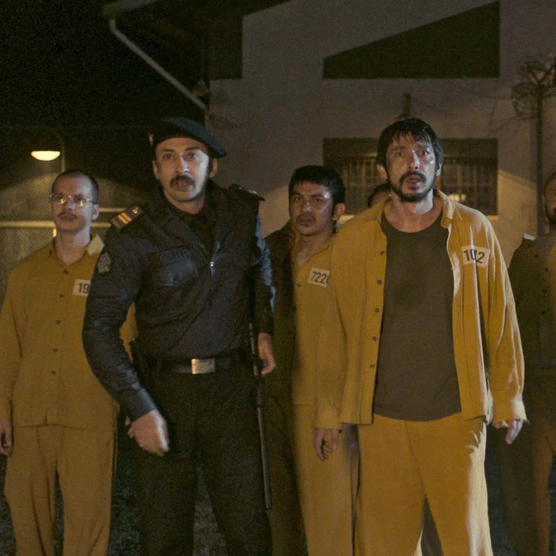 Abimana Aryasatya (foreground, second from left) in the Indonesian horror-comedy Ghost In The Cell.