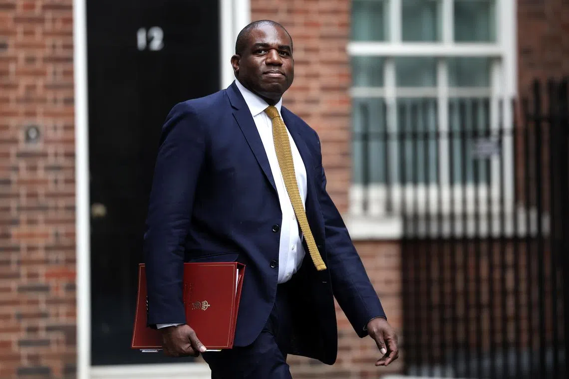 epa11529383 British Foreign Secretary David Lammy arrives at Downing Street for a cabinet meeting of the British government, in London, Britain, 06 August 2024.  EPA-EFE/ANDY RAIN