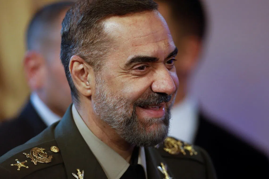 FILE PHOTO: Iranian Defense Minister Mohammad Reza Ashtiani reacts during a meeting of Venezuela's President Nicolas Maduro and Iranian President Ebrahim Raisi at the Miraflores Palace, in Caracas, Venezuela June 12, 2023. REUTERS/Leonardo Fernandez Viloria/File Photo