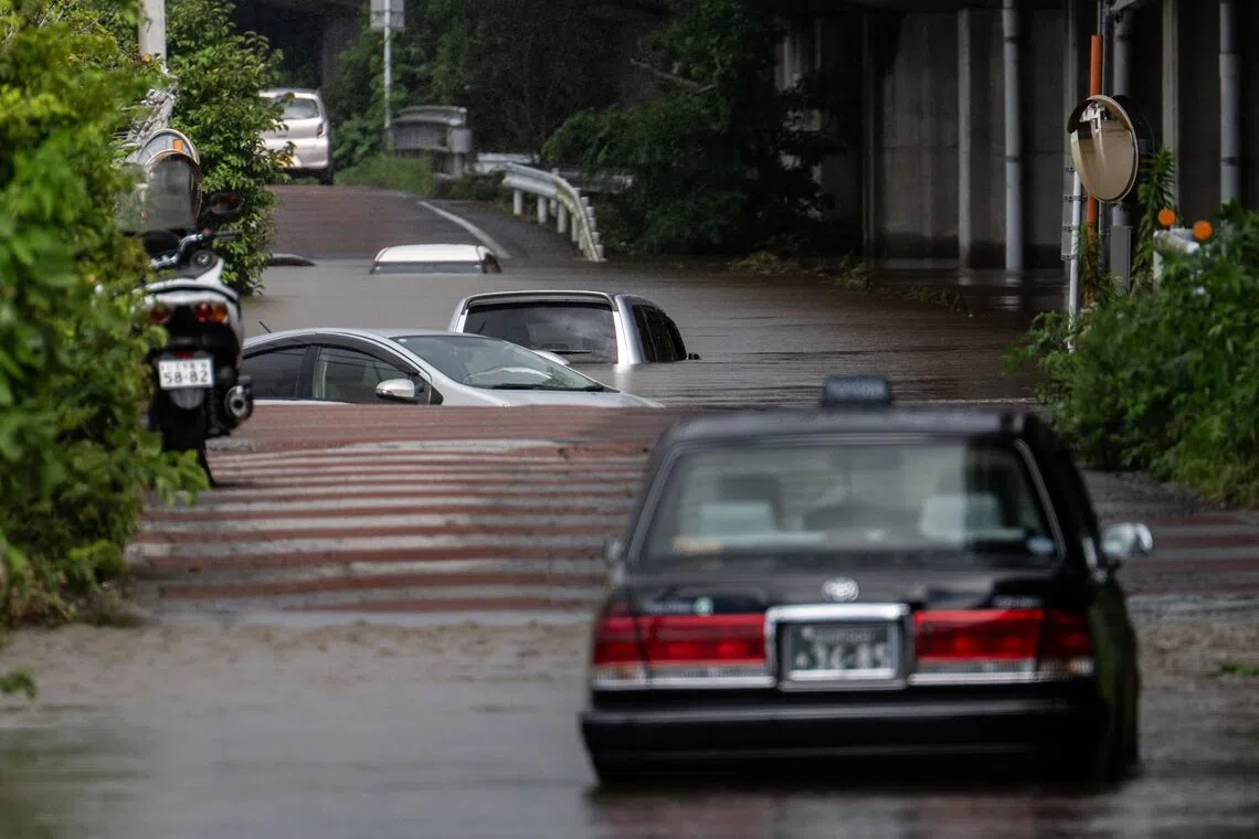 Japan’s Chiba prefecture deals with removing abandoned cars after record rainfall