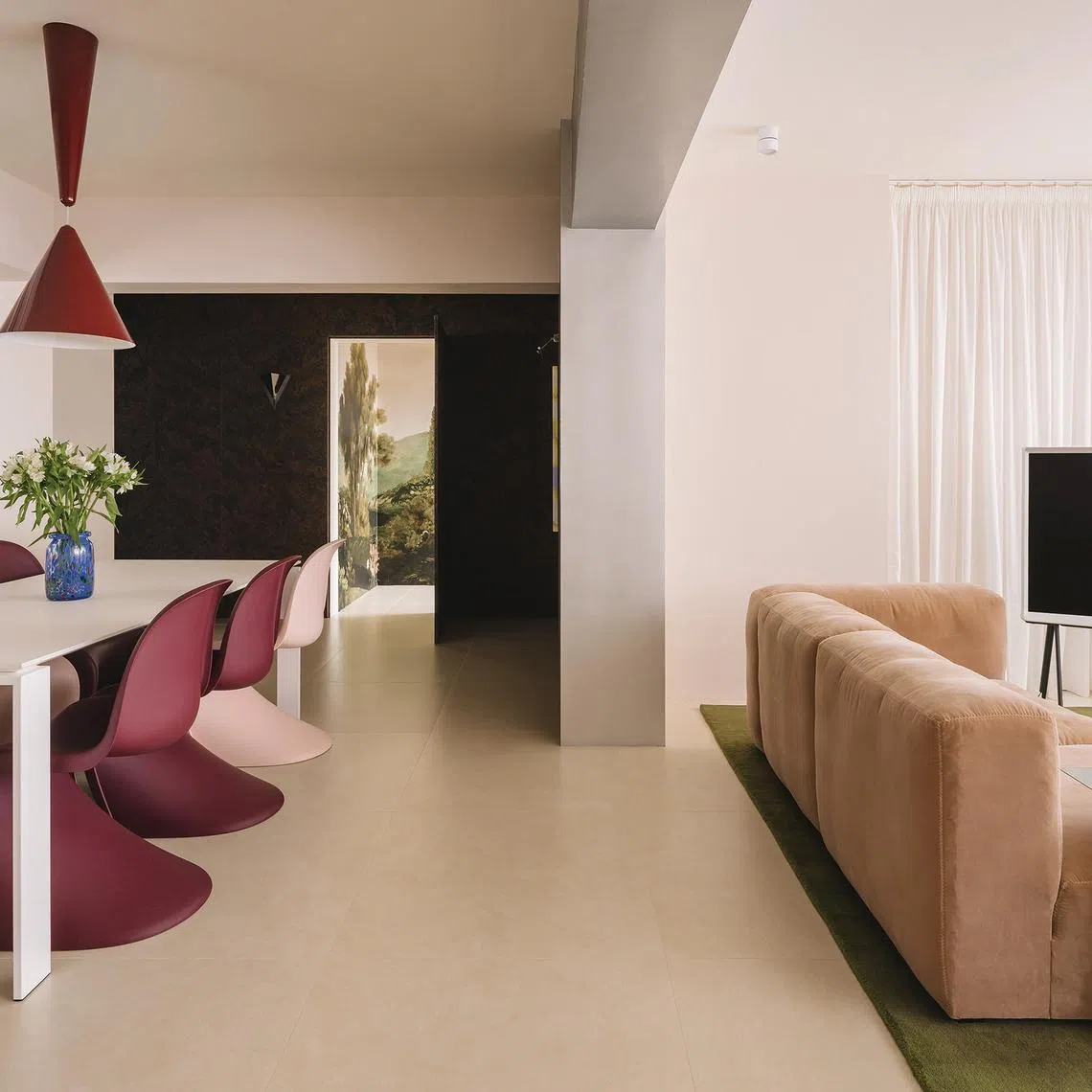 This BTO flat in north-east Singapore channels the spirit of the 1980s with modern-retro furniture and warm colours.