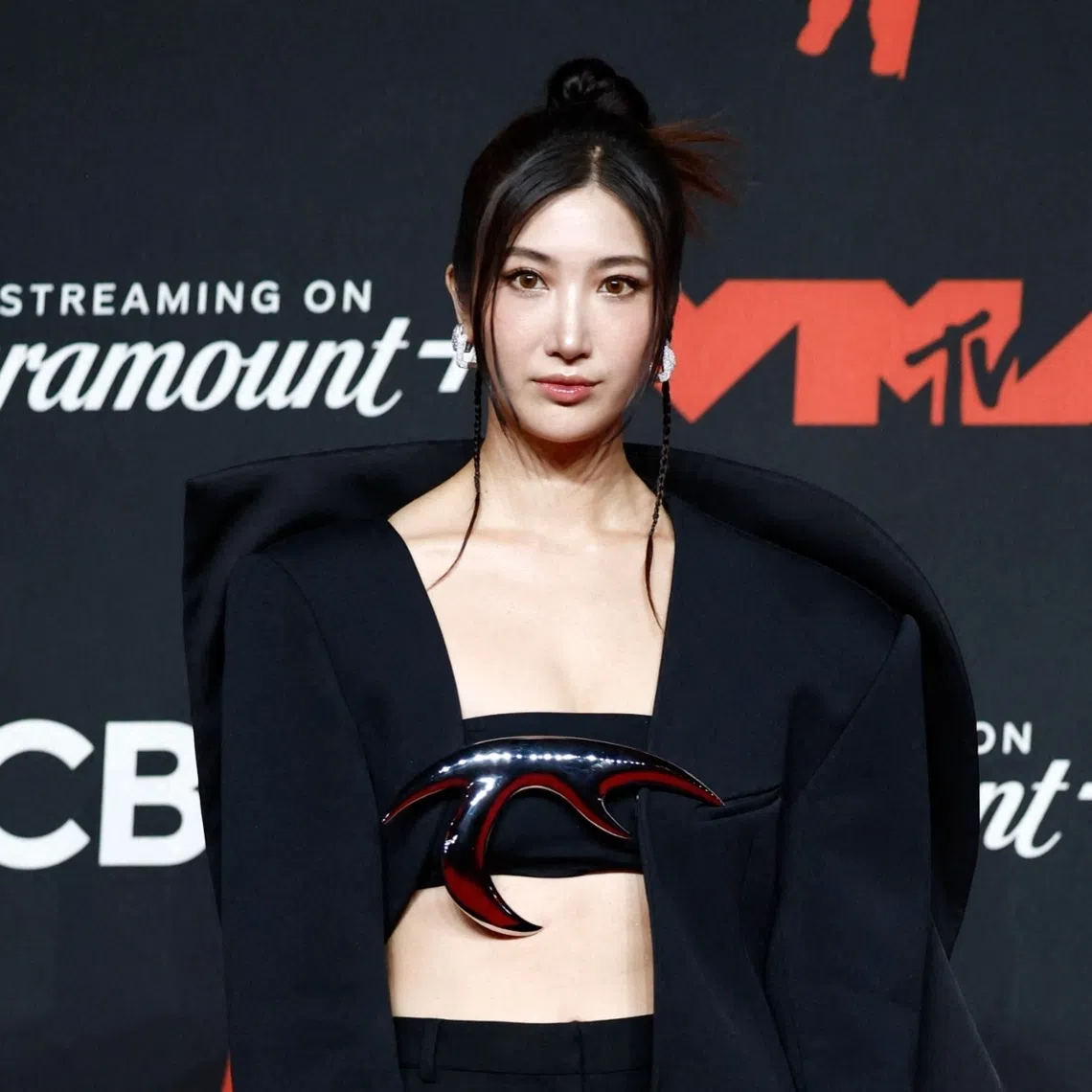 Ejae, who voices Rumi in Kpop Demon Hunters, poses on the red carpet at the 2025 MTV Video Music Awards in New York, US on Sept 7.