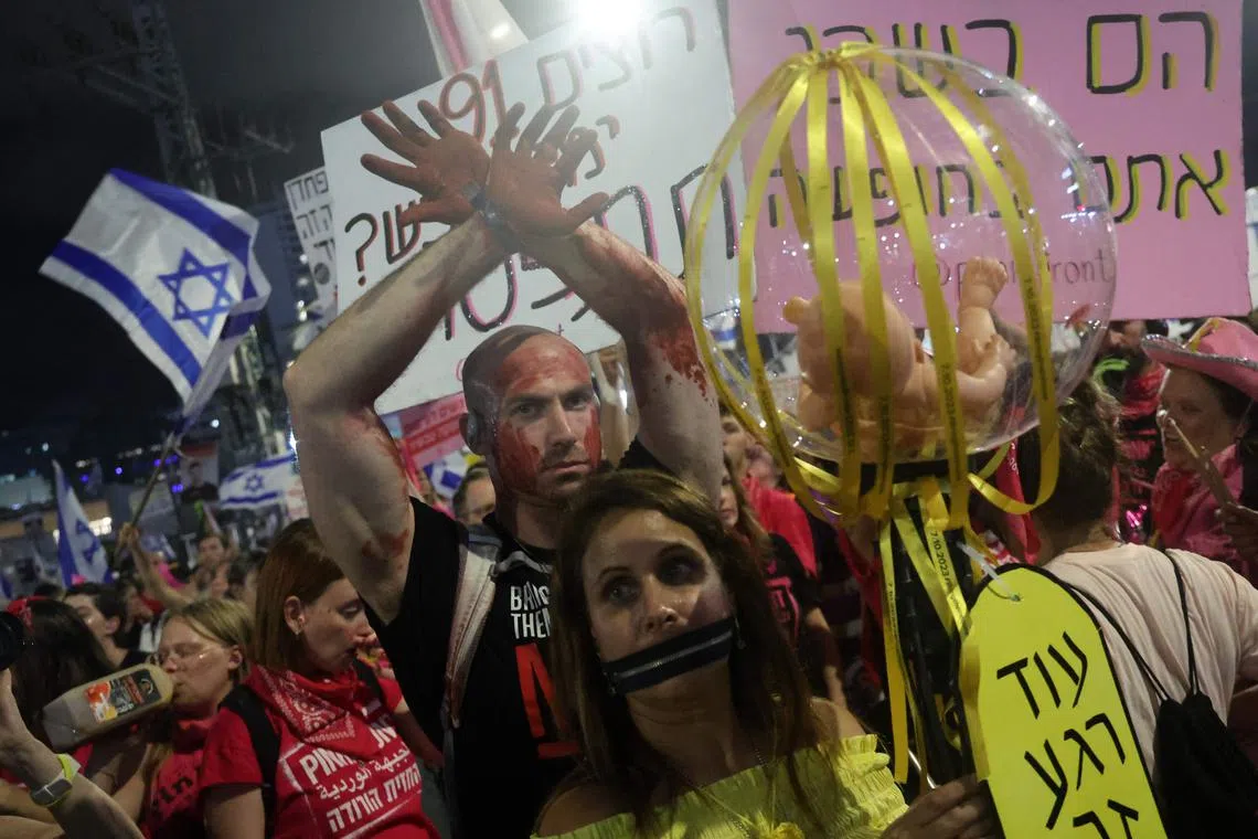 People take part in a demonstration of supporters and relatives of Israelis held hostage by Palestinian militants in Gaza.