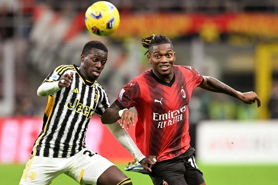FILE PHOTO: Soccer Football - Serie A - AC Milan v Juventus - San Siro, Milan, Italy - October 22, 2023 AC Milan's Rafael Leao in action with Juventus' Timothy Weah REUTERS/Daniele Mascolo/File Photo