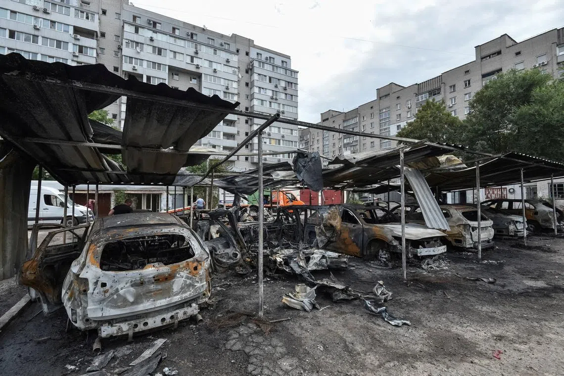 A view shows burned cars at the site of the Russian drone strike, amid Russia's attack on Ukraine, in Dnipro, Ukraine July 26, 2025. REUTERS/Mykola Synelnykov