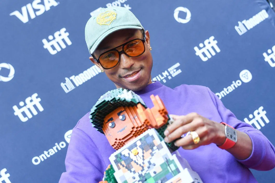 Pharrell Williams attends the international premiere of Piece By Piece at the Princess of Wales Theatre during the Toronto International Film Festival on Sept 10 in Toronto. 