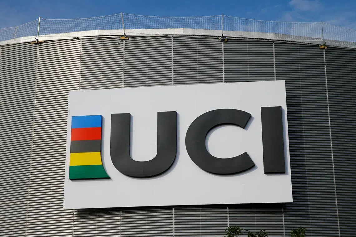 FILE PHOTO: A logo is pictured on the indoor track at the International Cycling Union (UCI) Federation headquarters in Aigle, Switzerland, September 27, 2017.  REUTERS/Denis Balibouse/File Photo
