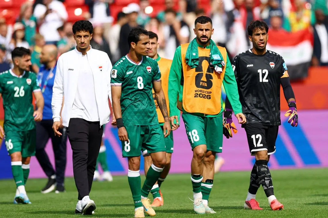 Soccer Football - FIFA World Cup 2026 - Group I - Senegal v Iraq - Toronto Stadium, Toronto, Canada - June 26, 2026 Iraq's Ibrahim Bayesh, Aymen Hussein and Jalal Hassan look dejected after the match REUTERS/Piroschka Van De Wouw