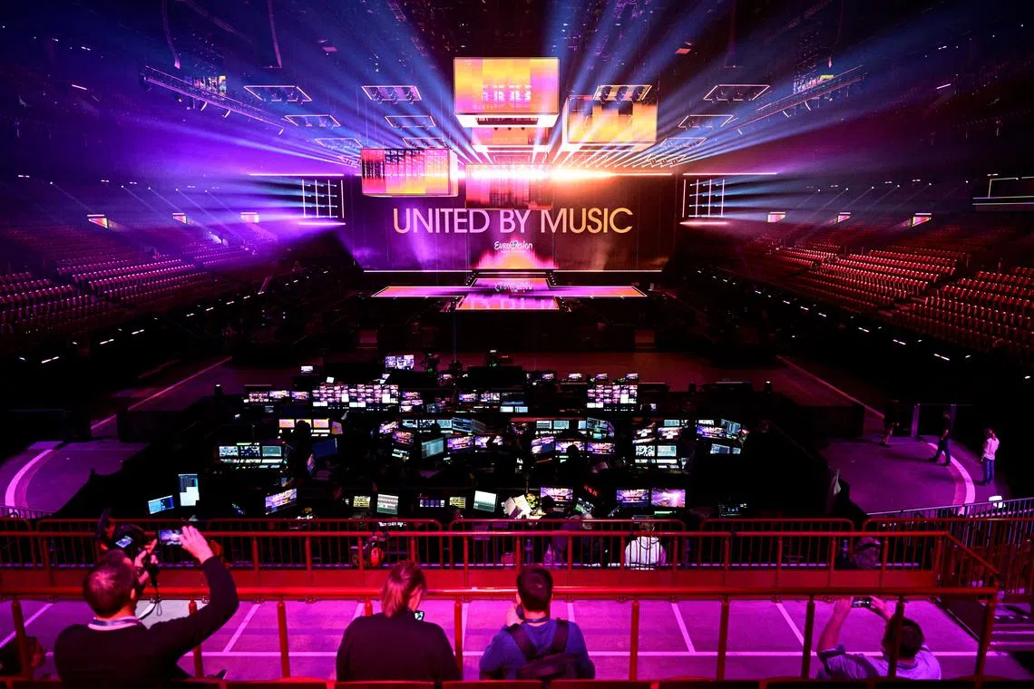 FILE PHOTO: People look at the completed Eurovision stage for the Eurovision Song Contest in May, at Malmo Arena during a press conference in Malmo, Sweden, April 25, 2024.  TT News Agency/Johan Nilsson via REUTERS/File Photo