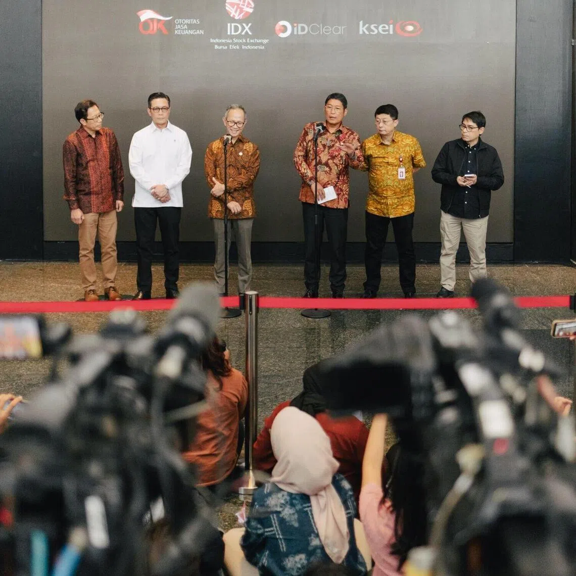 Indonesian Financial Service Authority officials attending a news conference at the Indonesia Stock Exchange in Jakarta on Jan 30.