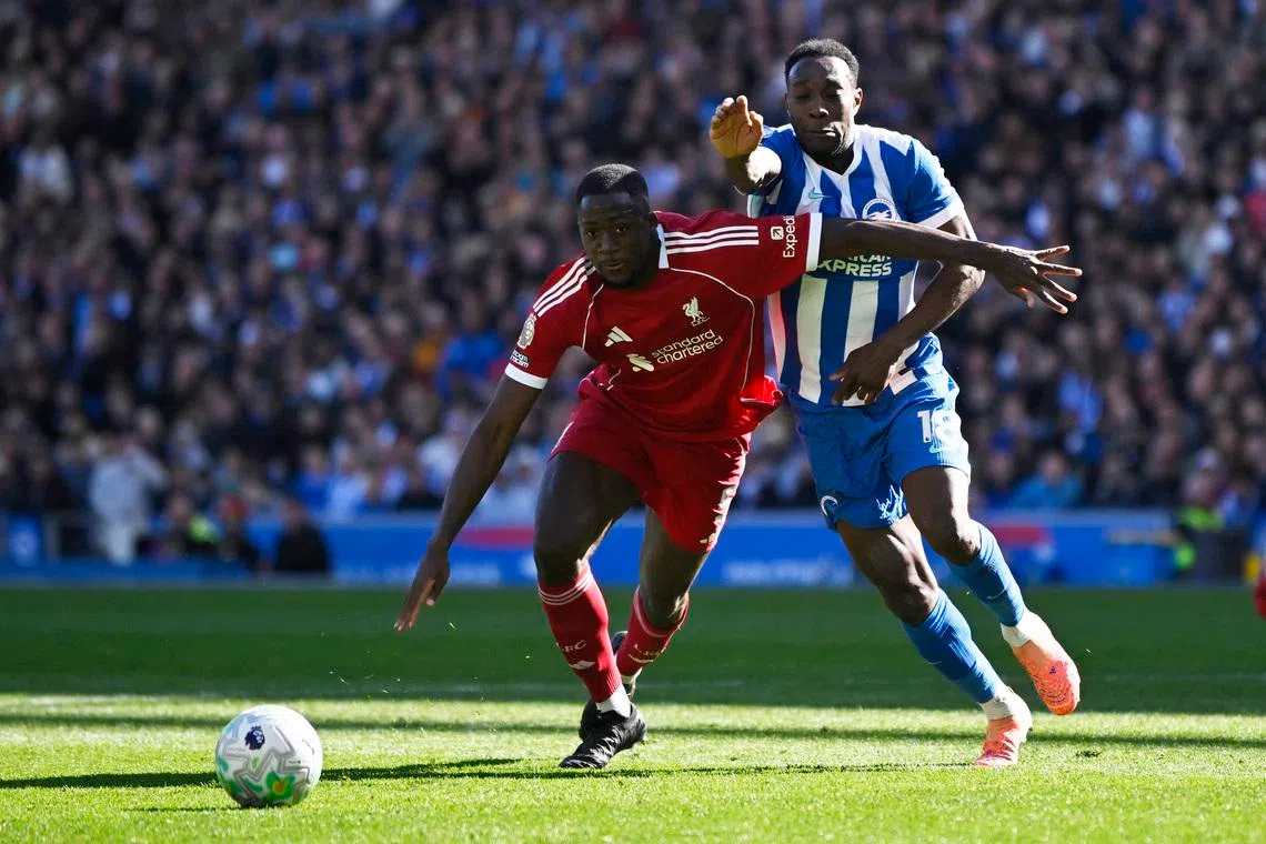 Welbeck dents Liverpool's Champions League hopes in Brighton ...