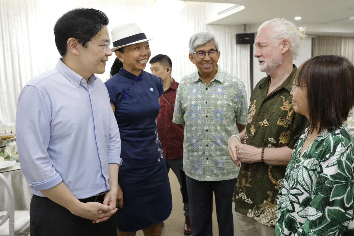 (From left) PM Lawrence Wong with former NMP Anthea Ong and former Cabinet minister Yaacob Ibrahim, who are co-chairs of the Palestinian Scholarship Initiative's administration committee, at a briefing and iftar (breaking fast) on March 18.