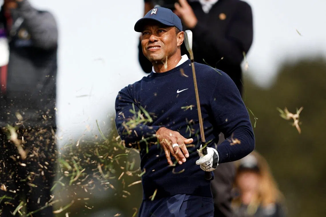 Tiger Woods plays his shot on the fifth hole during the first round of the Genesis Invitational.