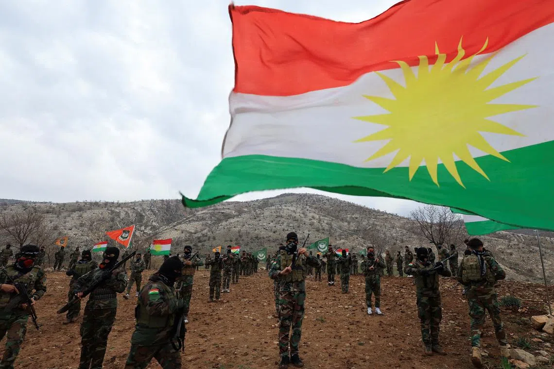 FILE PHOTO: Iranian Kurdish fighters from the Kurdistan Freedom Party (PAK) take part in a training session at a base on the outskirts of Erbil, Iraq February 12, 2026. REUTERS/Thaier Al-Sudani/File Photo