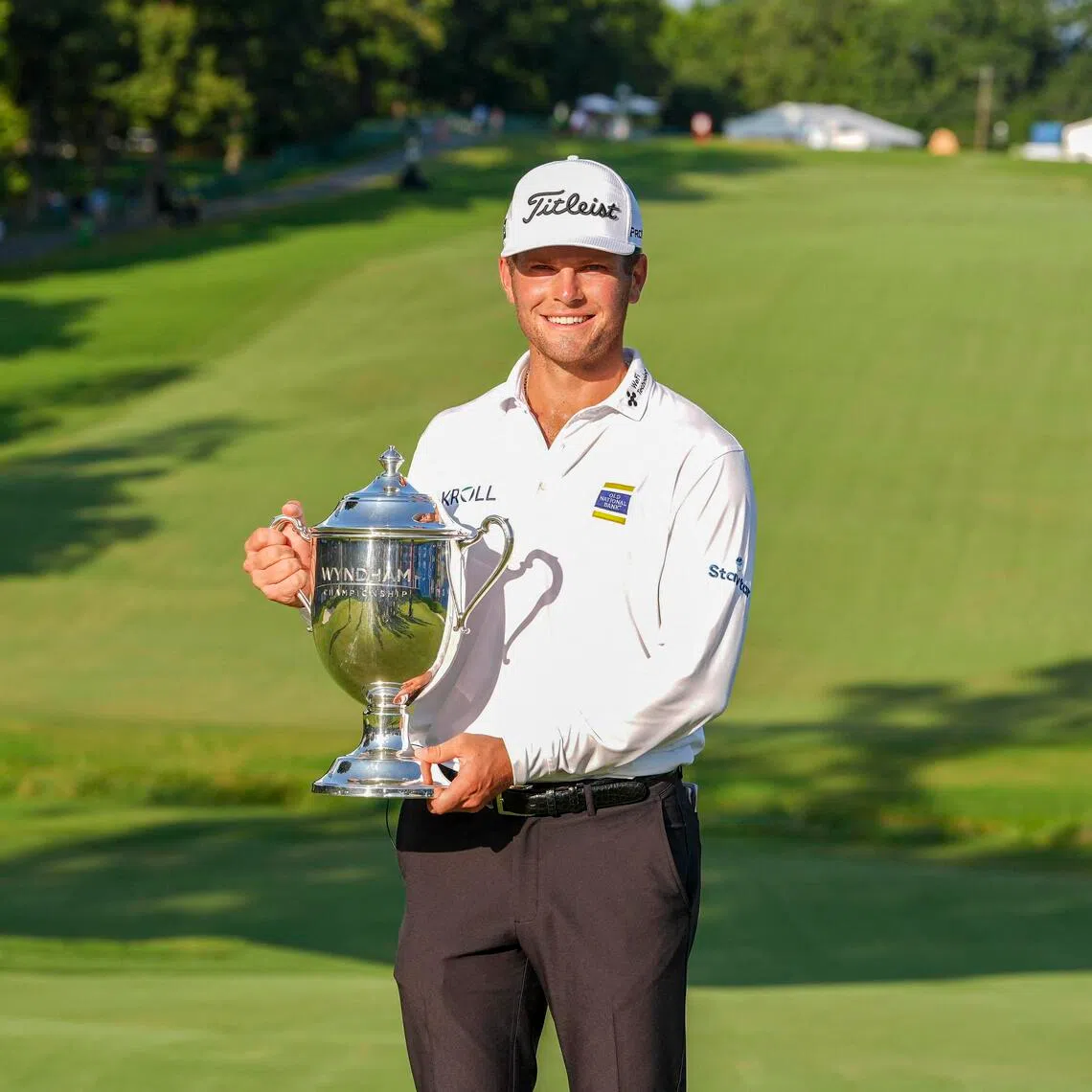 Michael Brennan with his trophy on Aug 9.