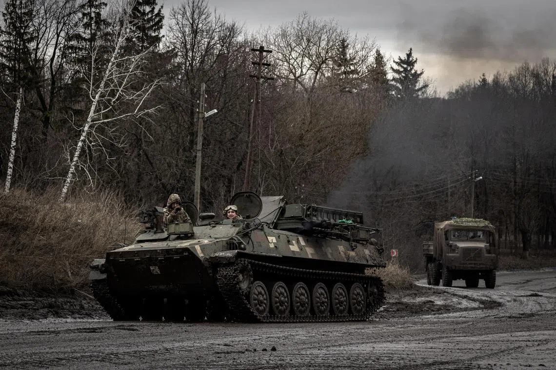 Ukrainian military vehicles in the country’s northern Sumy region travelling along a road close to the border with Russia’s Kursk region, in January 2025.