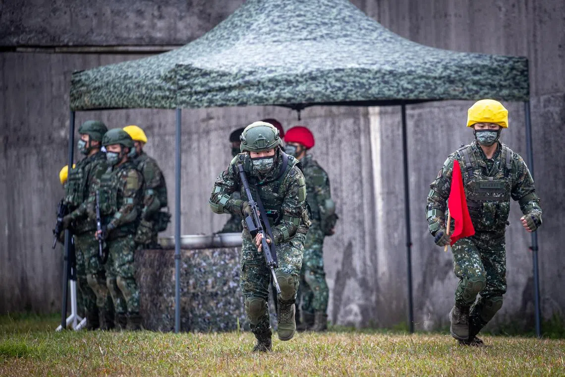 epa10481016 Taiwanese military personnel participate in a practical shooting training exercise inside a military base in Taoyuan, Taiwan, 21 February 2023. Taiwan's Ministry of Foreign Affairs (MOFA) extended appreciation to the US Secretary of State for his conversation with the Chinese Foreign Minister in which he reiterated support for peace and stability across the Taiwan Strait.  EPA-EFE/RITCHIE B. TONGO