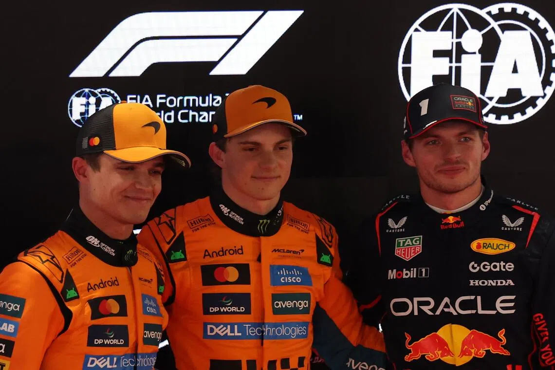 From left: McLaren drivers Lando Norris and Oscar Piastri alongside Red Bull's Max Verstappen at the Lusail International Circuit racetrack on Nov 29, 2025, ahead of the Formula One Qatar Grand Prix.