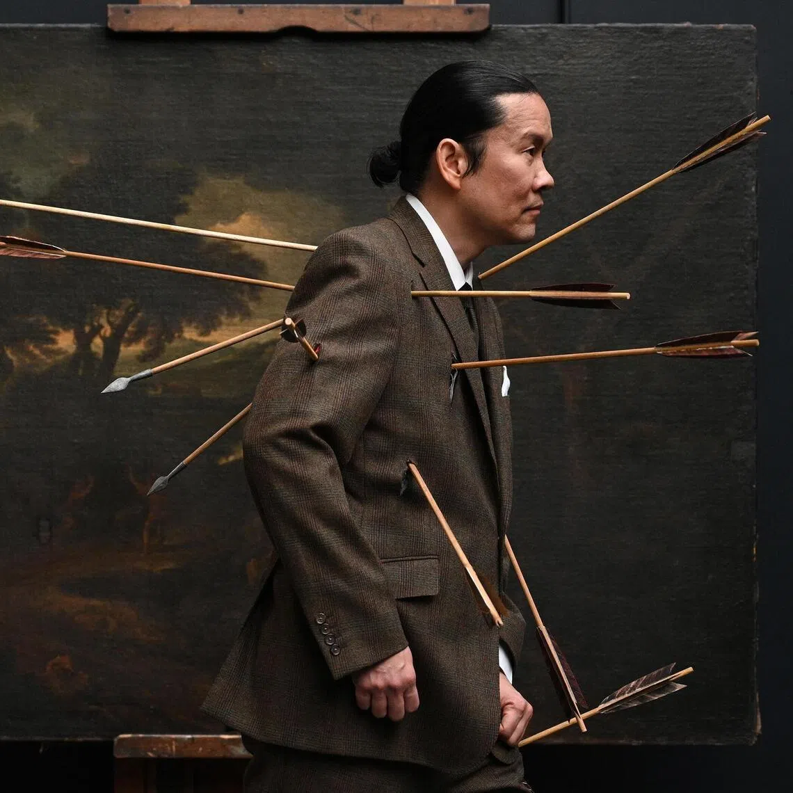 ohming - Singaporean artist Ming Wong, pierced with arrows, in a still from his film 'Dance of the sun on the water | Saltatio solis in aqua’, created as part of his residency with the National Gallery in London. 

Photo credit: Ming Wong. ONE TIME USE
for Life