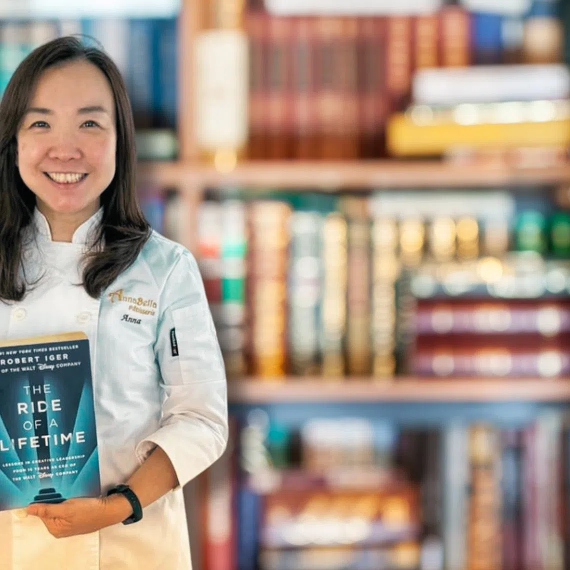 Ms Annabella Sonwelly with the book that has inspired her the most, The Ride Of A Lifetime by Rober Iger.